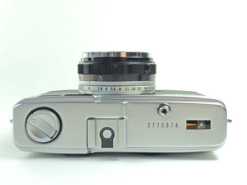 Early Olympus Trip 35 in dark green cowhide leather