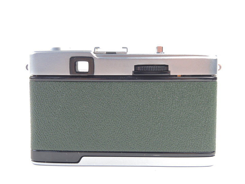 Early Olympus Trip 35 in dark green cowhide leather