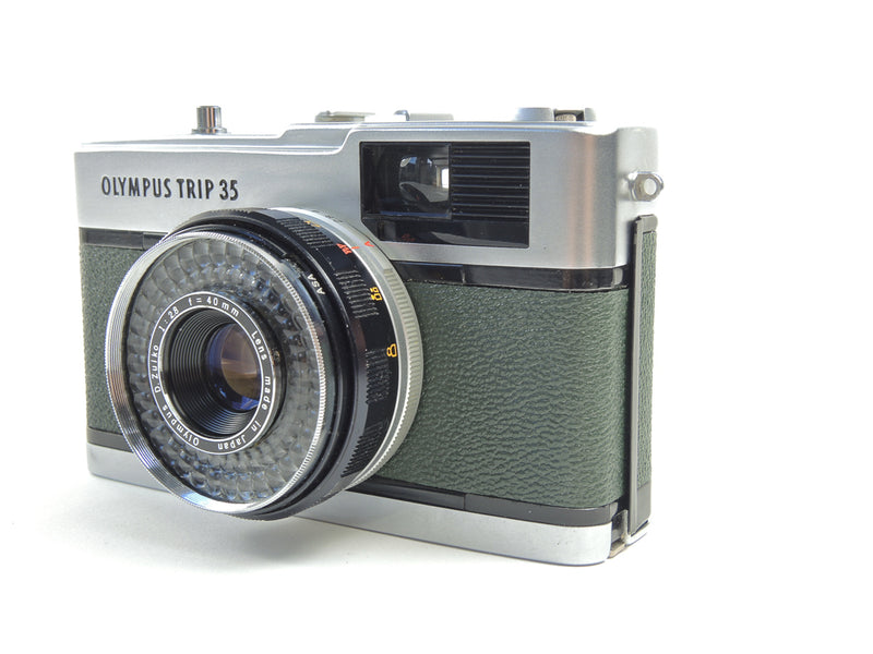 Early Olympus Trip 35 in dark green cowhide leather